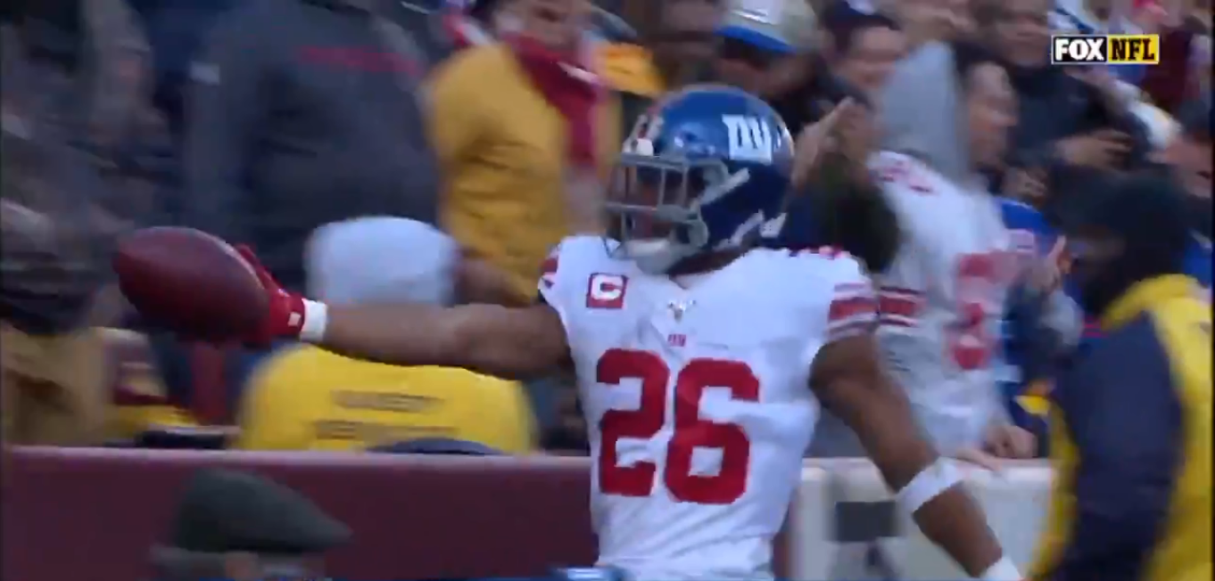 Saquon Barkley makes one young fan's holiday extra special with game ball