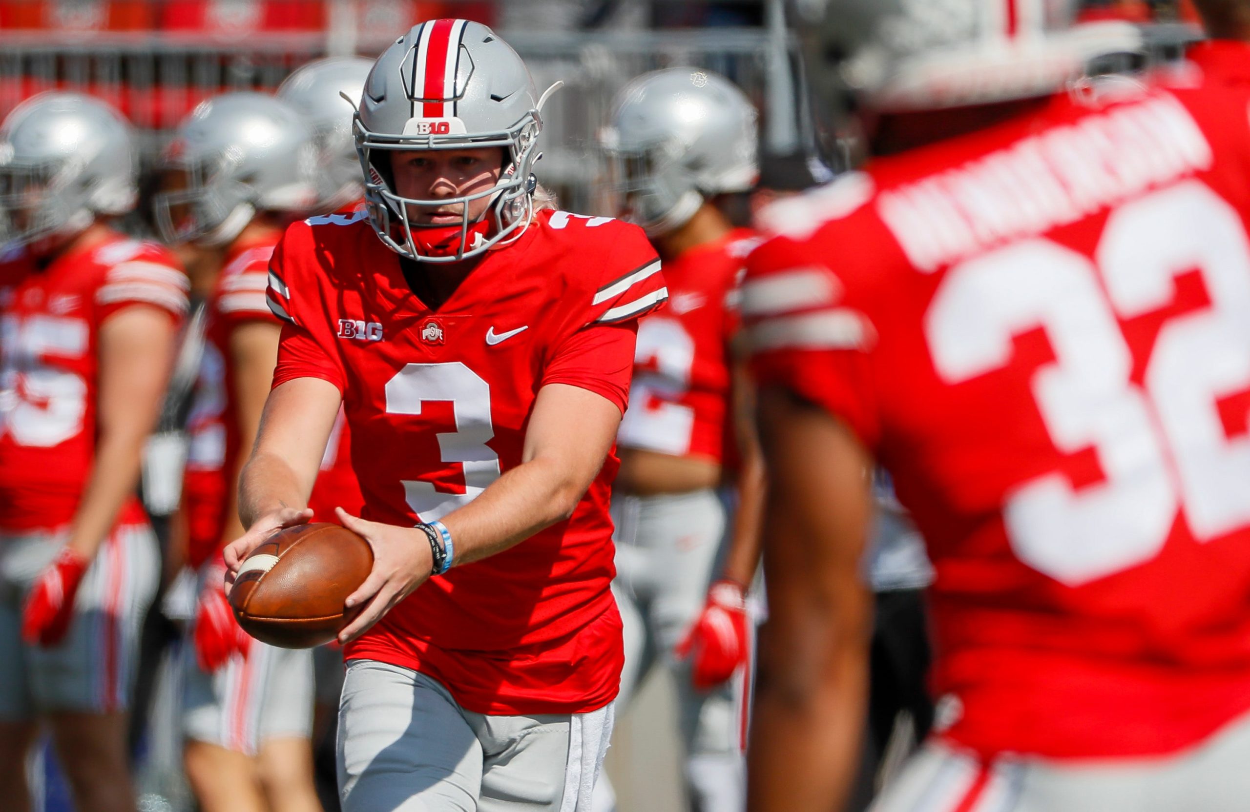 Ohio State true freshman QB added to travel roster following suspension