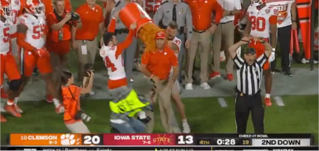 Dabo Swinney receives customary victory bath following Clemson's Cheez