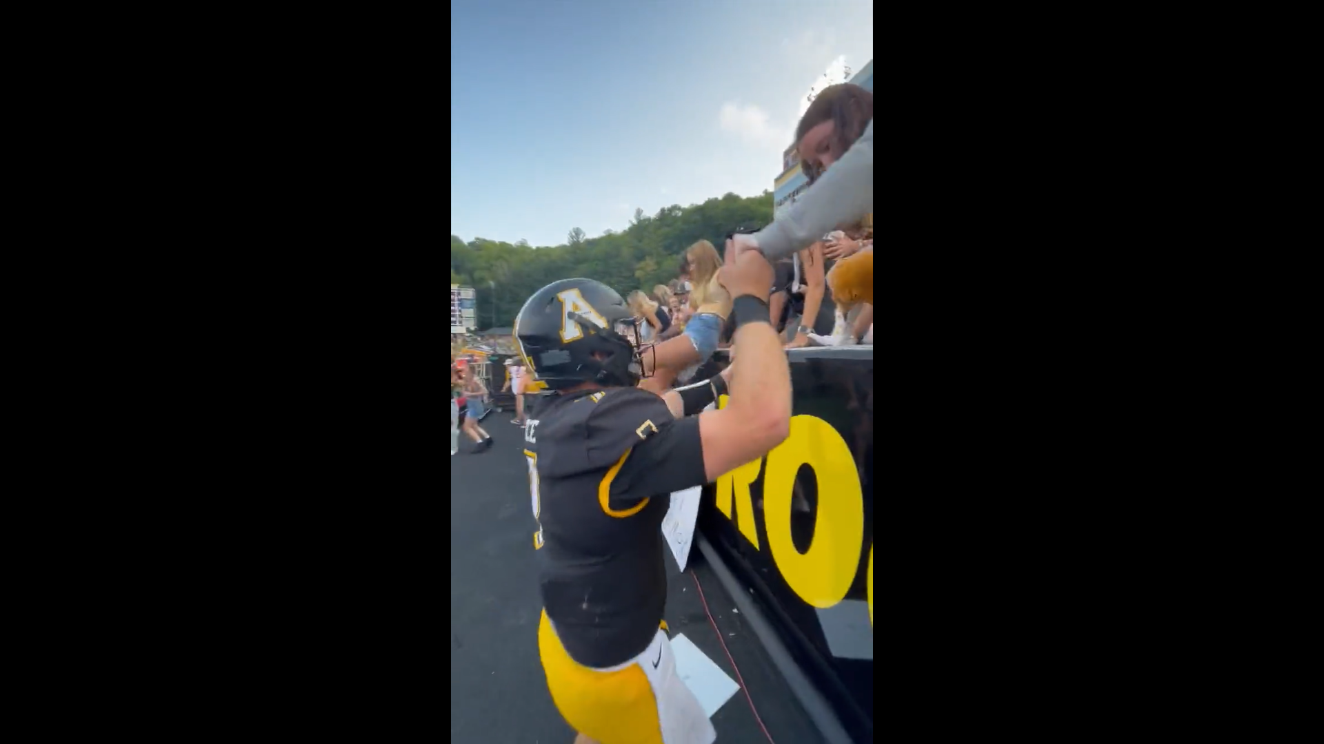 Appalachian State QB helped fans storm the field following Hail Mary
